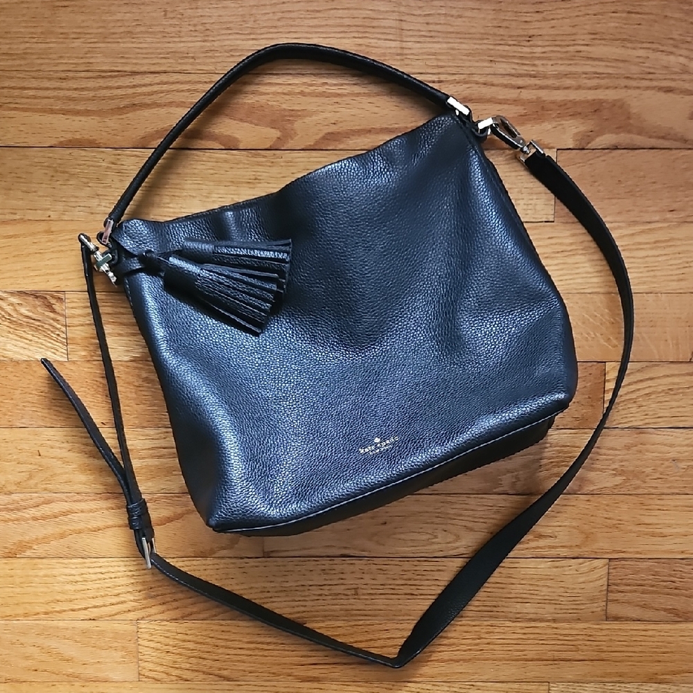 Chic Black Leather Shoulder Bag with Tassel by Kate Spade